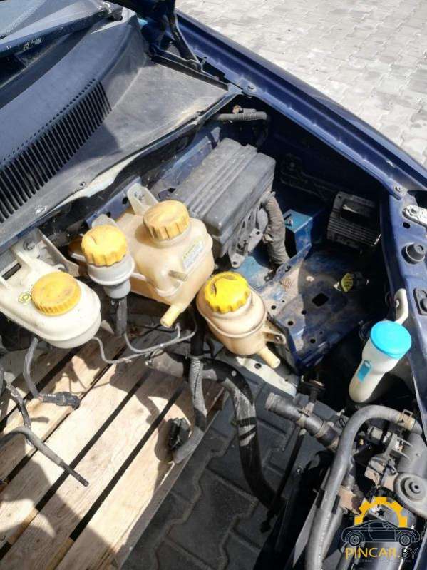 Насос (моторчик) омывателя стекла Daewoo Rezzo 2004г. | Фото № 1 Насос (моторчик) омывателя стекла Daewoo Rezzo 2004г. - Фото 1