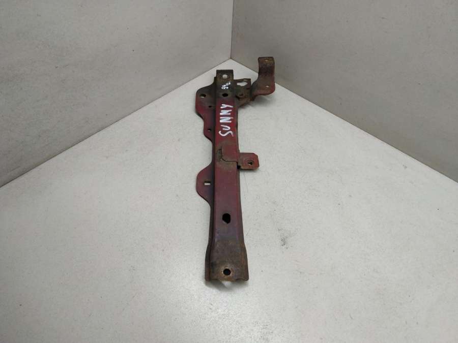 Передняя панель крепления облицовки (телевизор)  Nissan Sunny N14 седан 1991г. | Фото № 1   Передняя панель крепления облицовки (телевизор)  Nissan Sunny N14 седан 1991г. - Фото 1