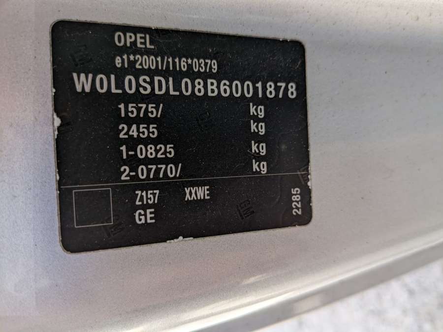 Ограничитель открывания двери передней  Opel Corsa D (2006-2014) Хетчбэк 3дв. 2010г. | Фото № 7   Ограничитель открывания двери передней  Opel Corsa D (2006-2014) Хетчбэк 3дв. 2010г. - Фото 7