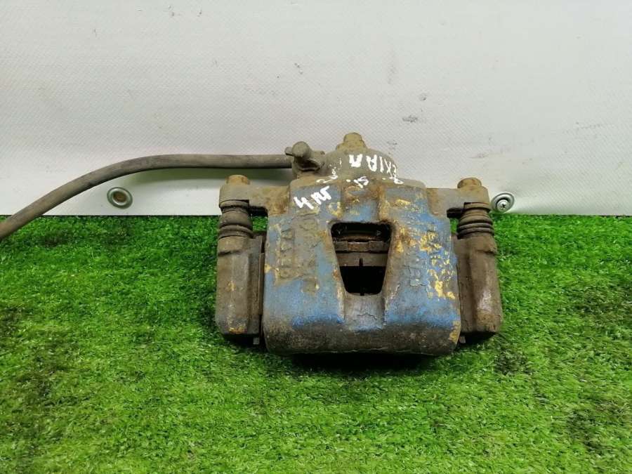 Суппорт тормозной передний правый Daewoo Nexia 1 2008г. | Фото № 1 Суппорт тормозной передний правый Daewoo Nexia 1 2008г. - Фото 1