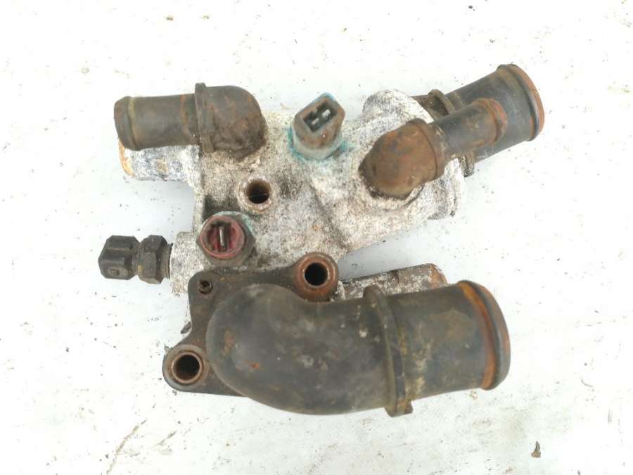 7633981 Корпус термостата Fiat Fiorino 2 поколение (1987-2013) 1994г. | Фото № 1 7633981 Корпус термостата Fiat Fiorino 2 поколение (1987-2013) 1994г. - Фото 1