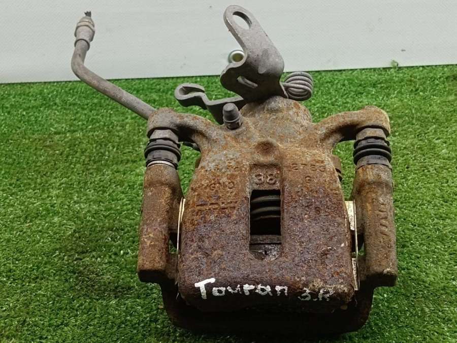 5Q0406DFR Суппорт тормозной задний правый Volkswagen Touran 1 2006г. | Фото № 1 5Q0406DFR Суппорт тормозной задний правый Volkswagen Touran 1 2006г. - Фото 1