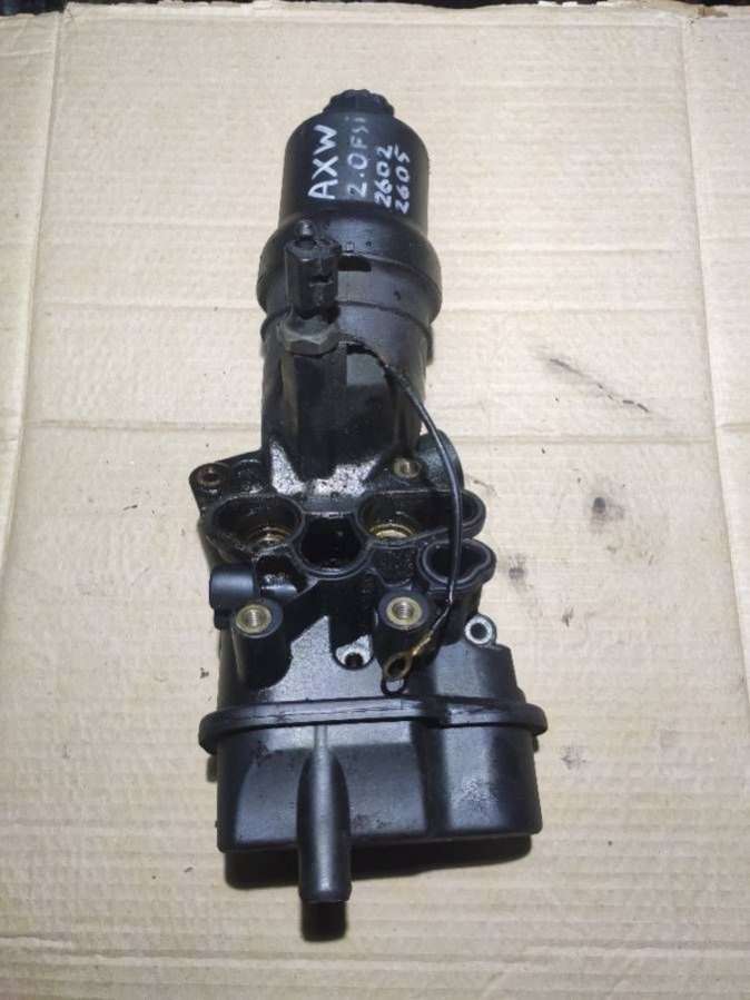 06D115397 Корпус масляного фильтра Audi A3 8P 2005г. | Фото № 1 06D115397 Корпус масляного фильтра Audi A3 8P 2005г. - Фото 1