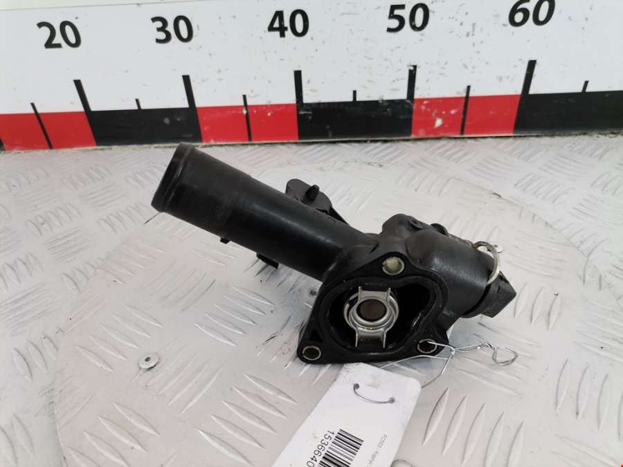 Корпус термостата Nissan Micra K12 (2002-2010) Хетчбэк 5дв. 2006г. | Фото № 1 Корпус термостата Nissan Micra K12 (2002-2010) Хетчбэк 5дв. 2006г. - Фото 1