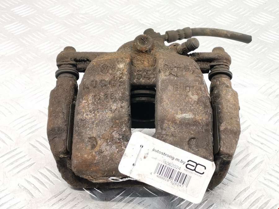 Суппорт передний левый Skoda Roomster (5J) (2006-2015) Универсал 2008г. | Фото № 1 Суппорт передний левый Skoda Roomster (5J) (2006-2015) Универсал 2008г. - Фото 1