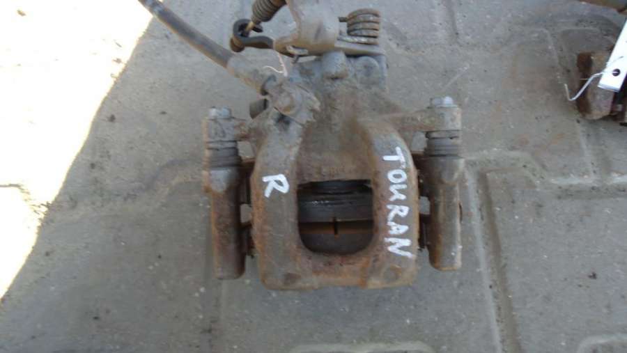 Суппорт задний правый Volkswagen Touran 1 поколение 2004г. | Фото № 1 Суппорт задний правый Volkswagen Touran 1 поколение 2004г. - Фото 1