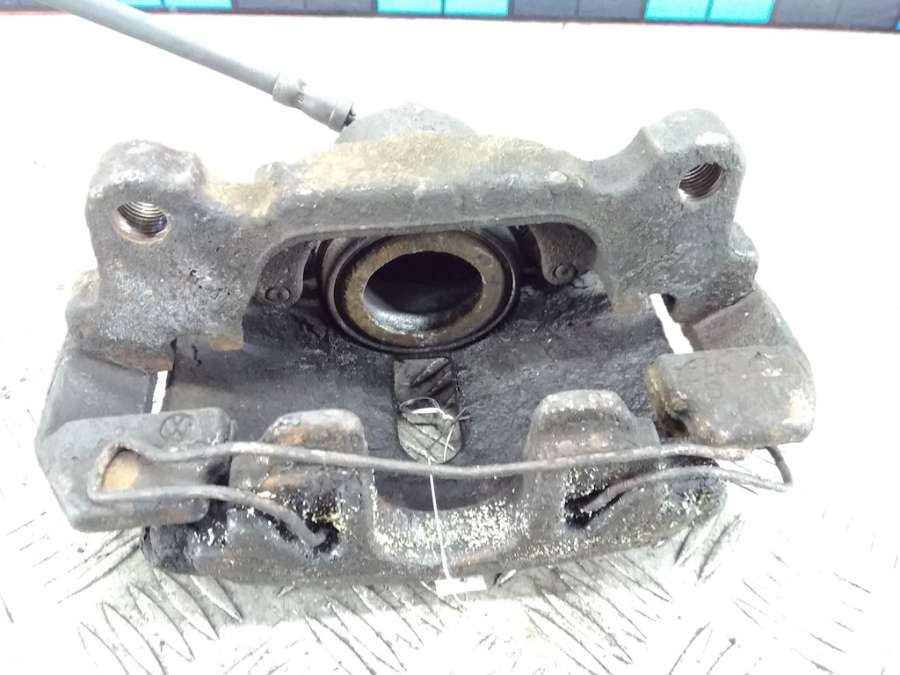 Суппорт передний левый Seat Ibiza 4 (6J) (2008-2018) Хетчбэк 5дв. 2014г. | Фото № 4 Суппорт передний левый Seat Ibiza 4 (6J) (2008-2018) Хетчбэк 5дв. 2014г. - Фото 4