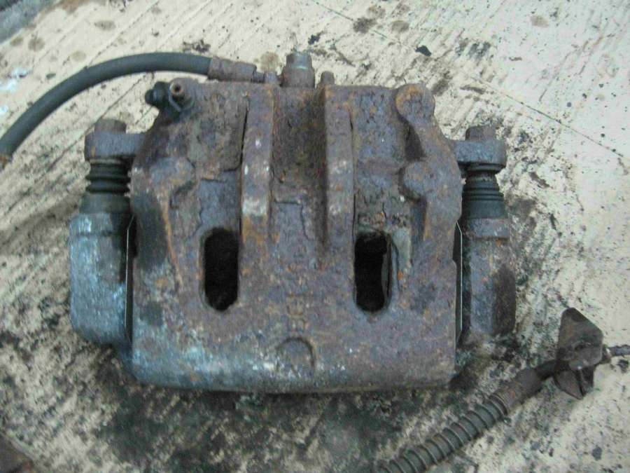 Суппорт передний правый Kia Sorento 1 JC (2002-2010) 2005г. | Фото № 1 Суппорт передний правый Kia Sorento 1 JC (2002-2010) 2005г. - Фото 1