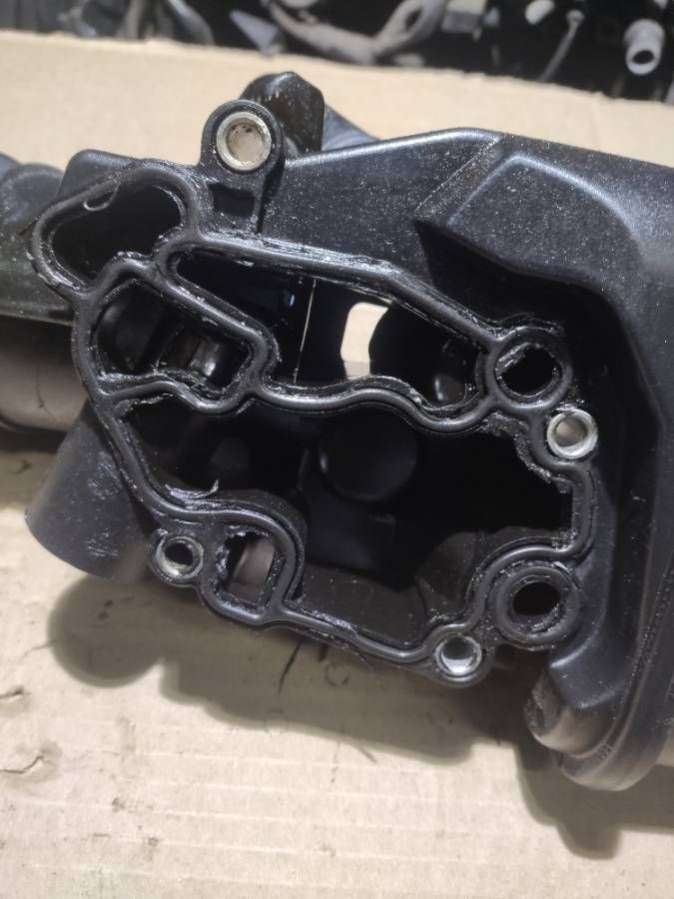 06D115397 Корпус масляного фильтра Audi A3 8P 2005г. | Фото № 4 06D115397 Корпус масляного фильтра Audi A3 8P 2005г. - Фото 4