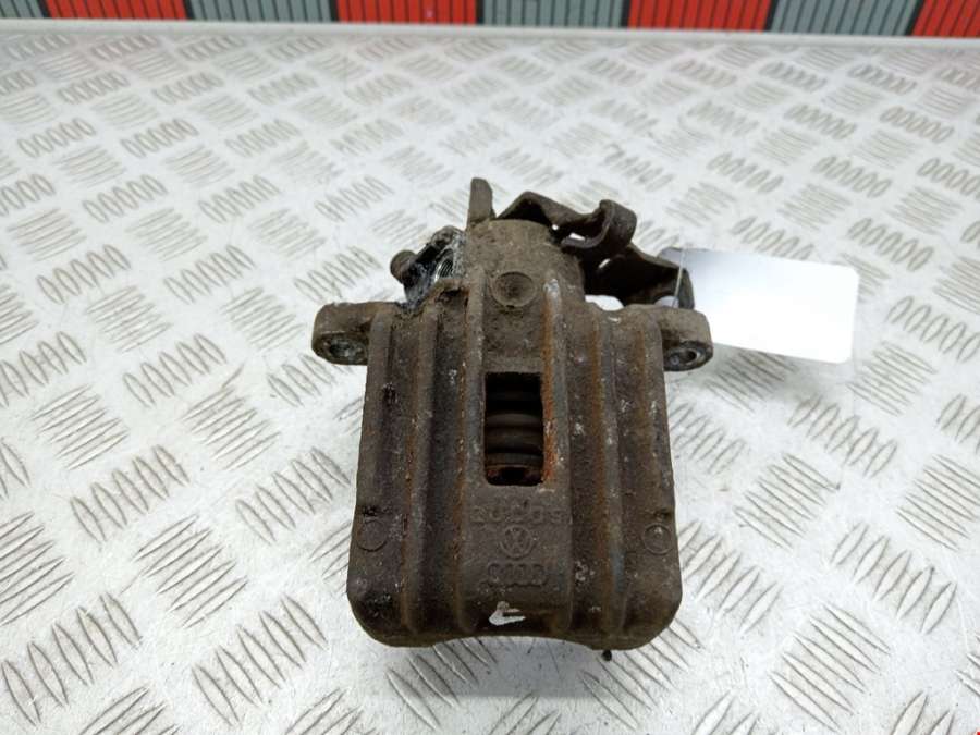 Суппорт задний левый Skoda Octavia 1U (1996-2010) Универсал 2003г. | Фото № 1 Суппорт задний левый Skoda Octavia 1U (1996-2010) Универсал 2003г. - Фото 1