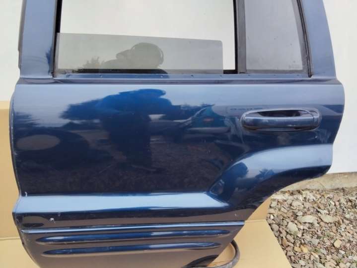 Дверь задняя левая  Jeep Grand Cherokee WJ (1999-2004) 1999г. | Фото № 4   Дверь задняя левая  Jeep Grand Cherokee WJ (1999-2004) 1999г. - Фото 4