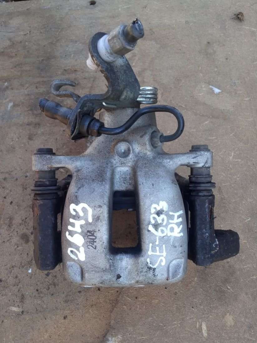 Суппорт тормозной задний правый Volkswagen Touran 1 2004г. | Фото № 1 Суппорт тормозной задний правый Volkswagen Touran 1 2004г. - Фото 1