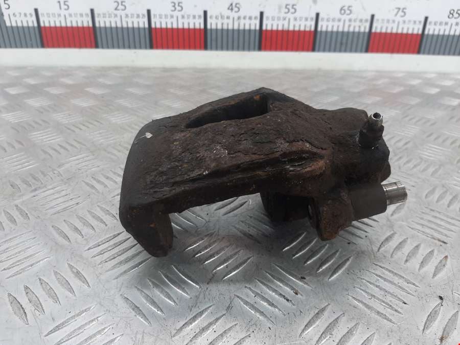 Суппорт передний левый Volkswagen Golf 5 (2003-2008) Хетчбэк 3дв. 2003г. | Фото № 2 Суппорт передний левый Volkswagen Golf 5 (2003-2008) Хетчбэк 3дв. 2003г. - Фото 2