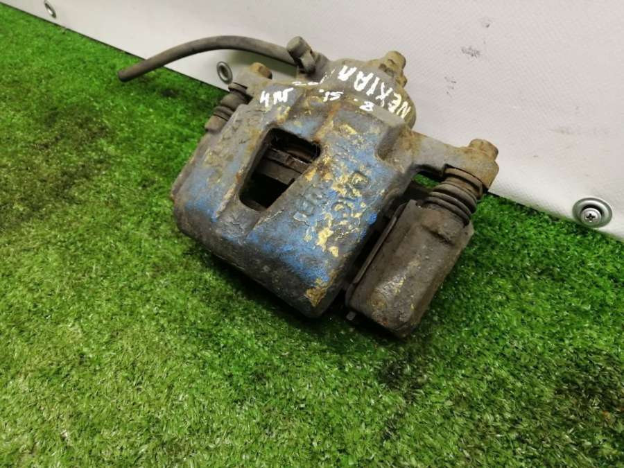 Суппорт тормозной передний правый Daewoo Nexia 1 2008г. | Фото № 4 Суппорт тормозной передний правый Daewoo Nexia 1 2008г. - Фото 4