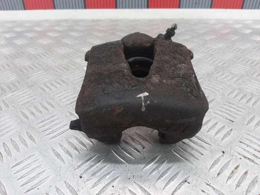 Суппорт передний левый Volkswagen Golf 5 (2003-2008) Хетчбэк 3дв. 2003г. | Фото № 1 Суппорт передний левый Volkswagen Golf 5 (2003-2008) Хетчбэк 3дв. 2003г. - Фото 1