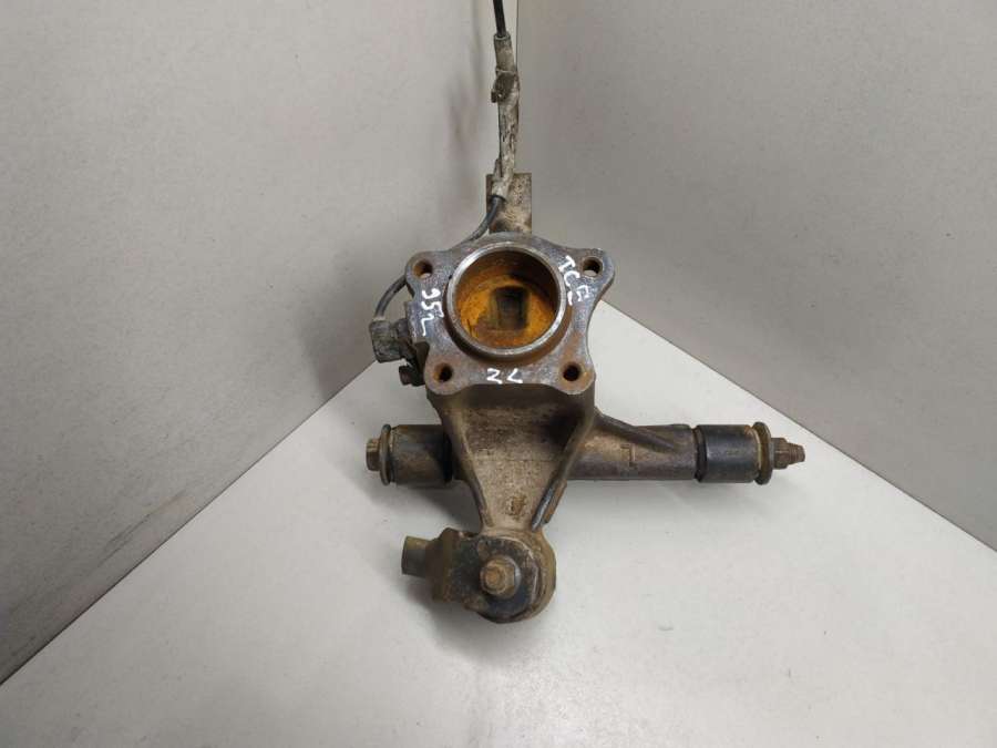 Кулак задний левый  Toyota Carina E  1995г. | Фото № 1   Кулак задний левый  Toyota Carina E  1995г. - Фото 1