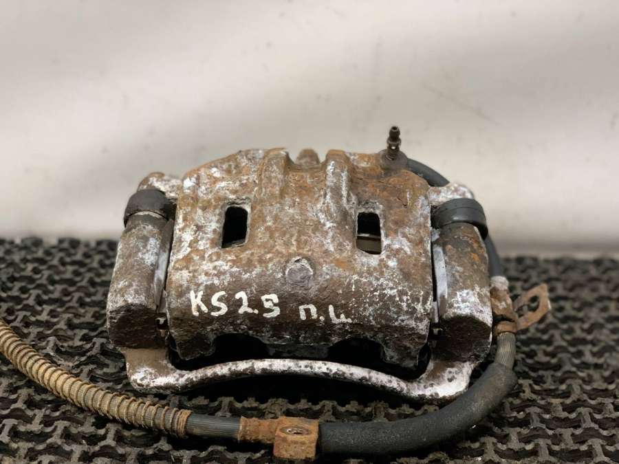 Суппорт передний левый Kia Sorento внедорожник 2003г. | Фото № 1 Суппорт передний левый Kia Sorento внедорожник 2003г. - Фото 1