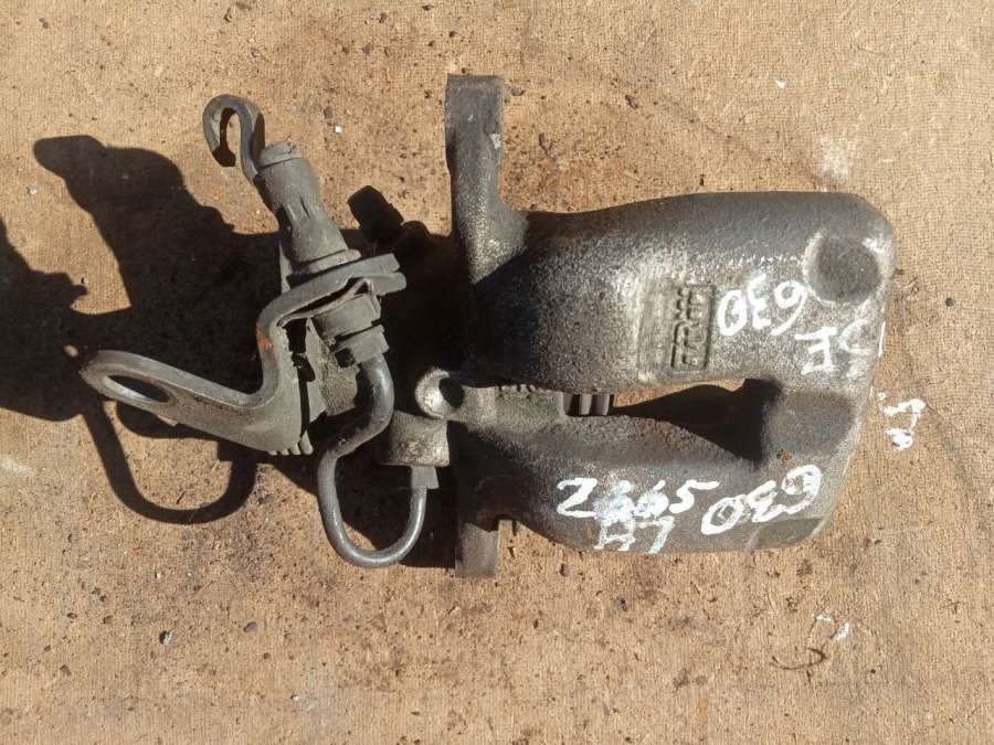 Суппорт тормозной задний правый Volkswagen Touran 1 2004г. | Фото № 1 Суппорт тормозной задний правый Volkswagen Touran 1 2004г. - Фото 1