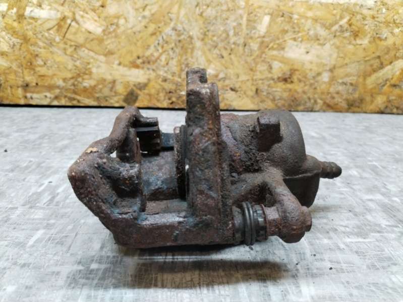 Суппорт передний левый DACIA Logan МИНИВЕН 2007г. | Фото № 4 Суппорт передний левый DACIA Logan МИНИВЕН 2007г. - Фото 4