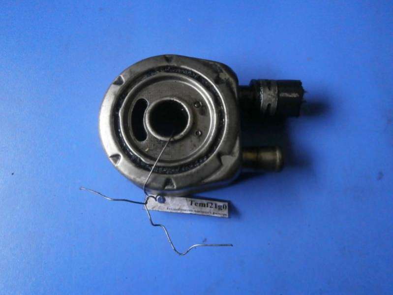 93FF-6B856-AA Теплообменник масляного фильтра Ford Mondeo 2 поколение 1998г. | Фото № 1 93FF-6B856-AA Теплообменник масляного фильтра Ford Mondeo 2 поколение 1998г. - Фото 1