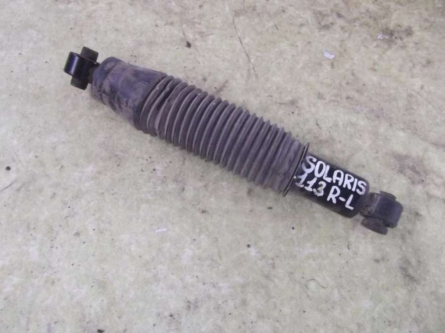 Задние амортизаторы солярис 2015. Амортизатор задней подвески солярис 2011 ctr. Hyundai solaris задняя стойка. Задняя стойка солярис. Задний амортизатор hyundai solaris 2019.