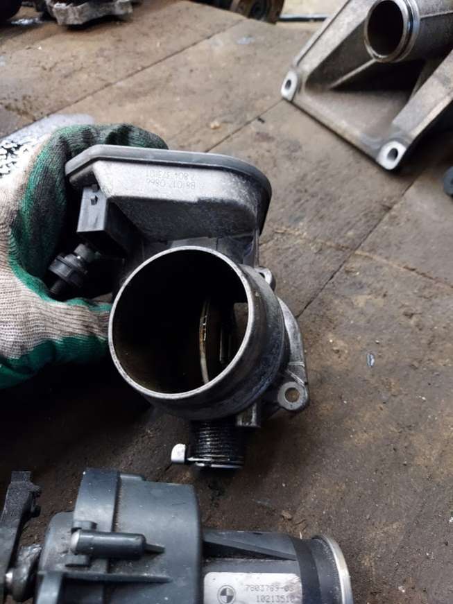 7804373 Заслонка дроссельная BMW X3 E83 2008г. | Фото № 1 7804373 Заслонка дроссельная BMW X3 E83 2008г. - Фото 1