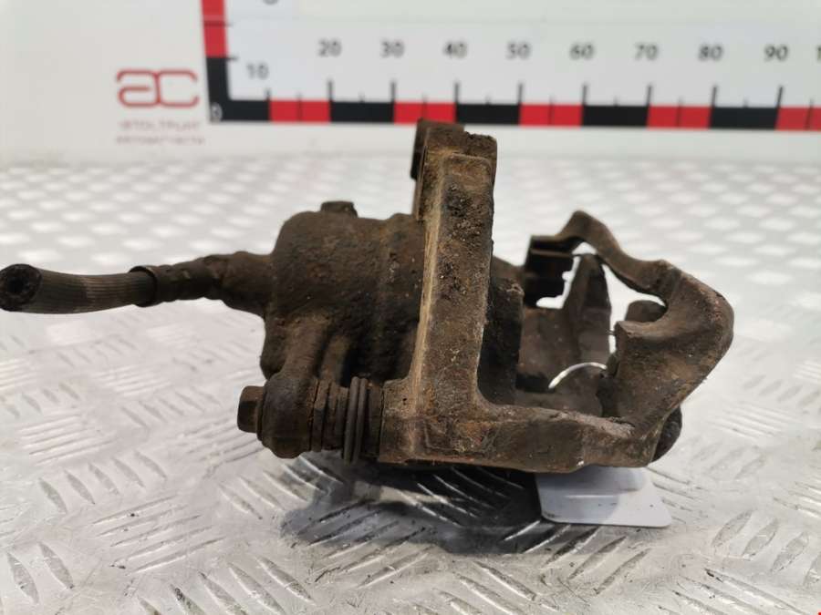 Суппорт передний левый Skoda Roomster (5J) (2006-2015) Универсал 2008г. | Фото № 5 Суппорт передний левый Skoda Roomster (5J) (2006-2015) Универсал 2008г. - Фото 5