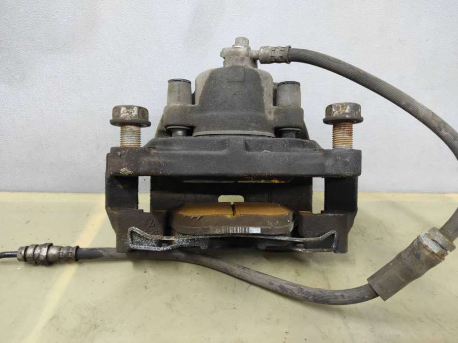 Суппорт тормозной передний правый Volkswagen Passat USA седан 2017г. | Фото № 1 Суппорт тормозной передний правый Volkswagen Passat USA седан 2017г. - Фото 1