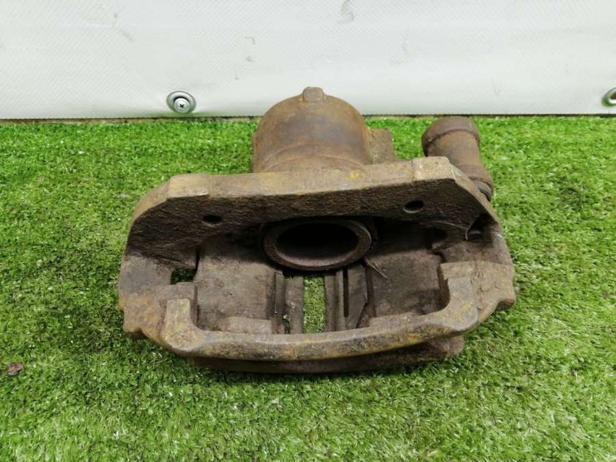Суппорт тормозной передний правый Ford Escort 5 1993г. | Фото № 5 Суппорт тормозной передний правый Ford Escort 5 1993г. - Фото 5
