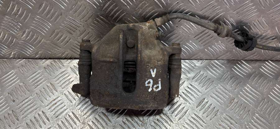 Суппорт передний левый  Renault Scenic 1999г. | Фото № 1   Суппорт передний левый  Renault Scenic 1999г. - Фото 1