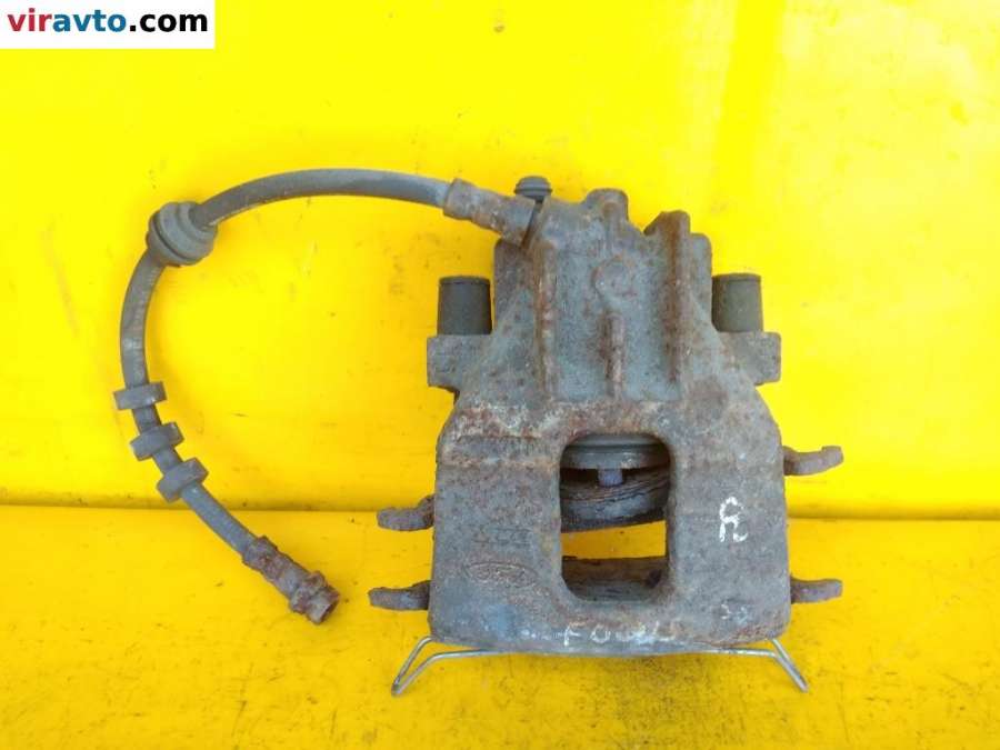 Суппорт передний правый Ford Focus 1 поколение (1998-2004) 2000г. | Фото № 1 Суппорт передний правый Ford Focus 1 поколение (1998-2004) 2000г. - Фото 1