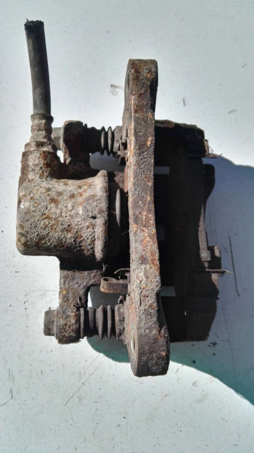 Суппорт тормозной задний левый Kia Joice 2000г. | Фото № 2 Суппорт тормозной задний левый Kia Joice 2000г. - Фото 2