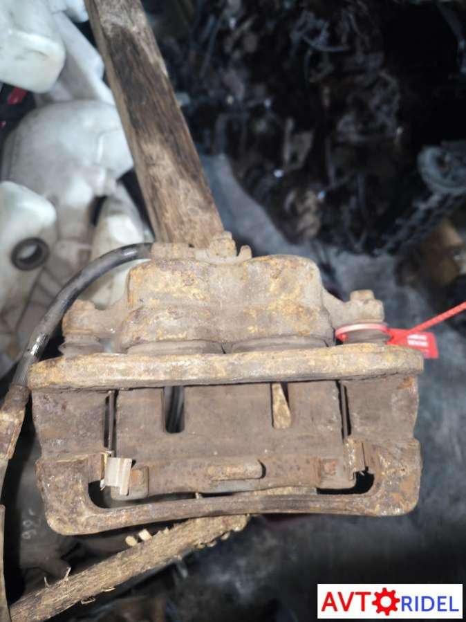 Суппорт передний левый Kia Sorento 1 (2002 - 2009) 2005г. | Фото № 1 Суппорт передний левый Kia Sorento 1 (2002 - 2009) 2005г. - Фото 1