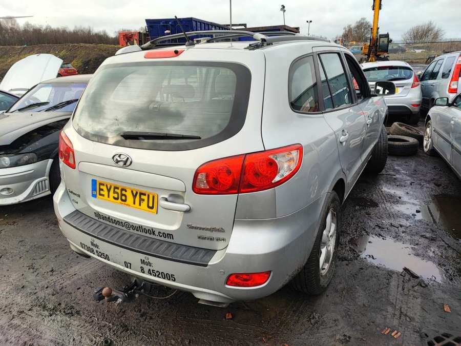 Замок крышки багажника Hyundai Santa Fe 2 (CM) (2005-2012) Внедорожник 5дв. 2006г. | Фото № 11 Замок крышки багажника Hyundai Santa Fe 2 (CM) (2005-2012) Внедорожник 5дв. 2006г. - Фото 11