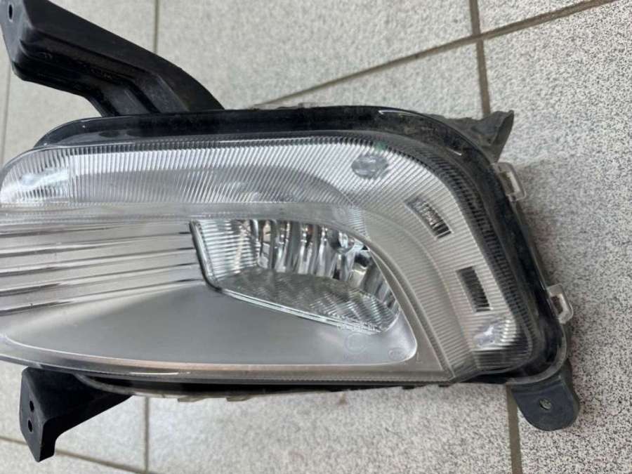 Противотуманки джили атлас. Джили атлас противотуманные фары. Geely Atlas противотуманные фары. Противотуманные фары Geely Atlas Pro. Geely 7054002600