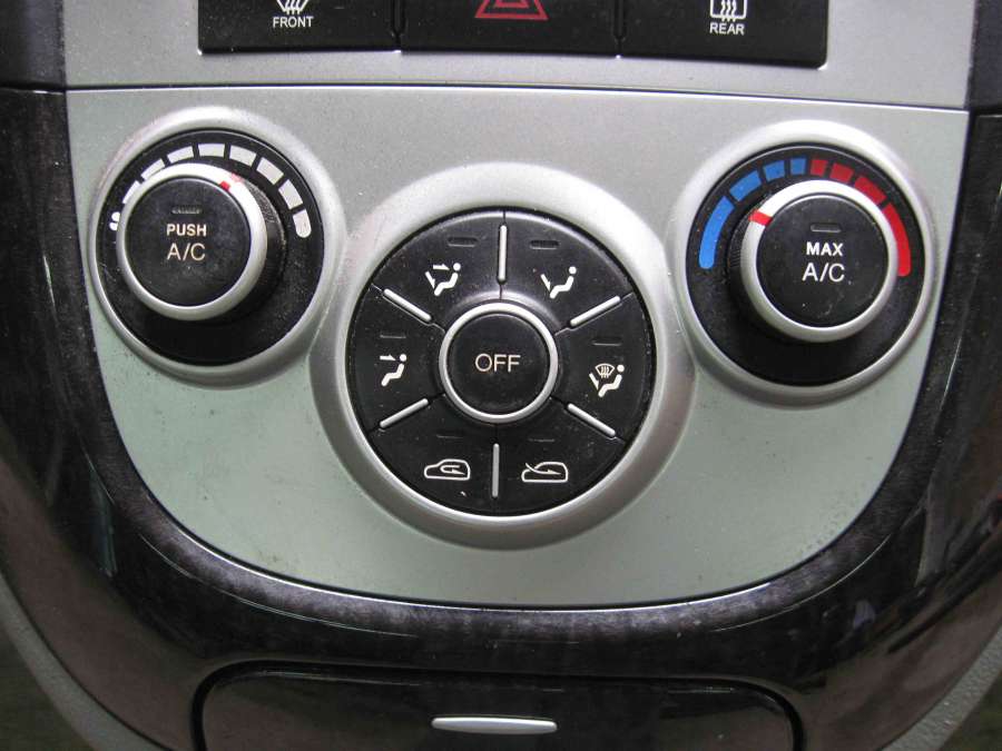 Климат контроль санта фе. Hyundai Santa Fe 2 блок климата. Панель климат контроля Санта Фе 2. Блок климат контроля Санта Фе 2. Санта Фе Классик блок климат контроля.